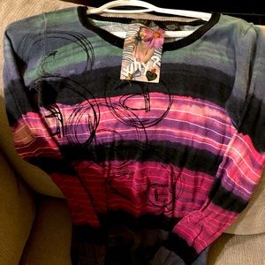 Small thin long sleeve sweater.